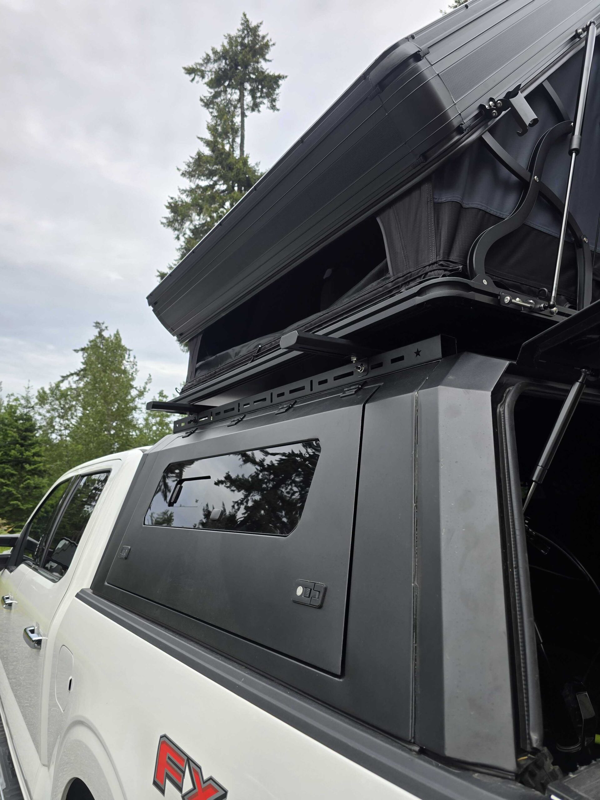 Aluminum truck canopy for Ford F-150 5.5 FT and 6.5 FT models (2015–2024) designed for secure storage and overland setups