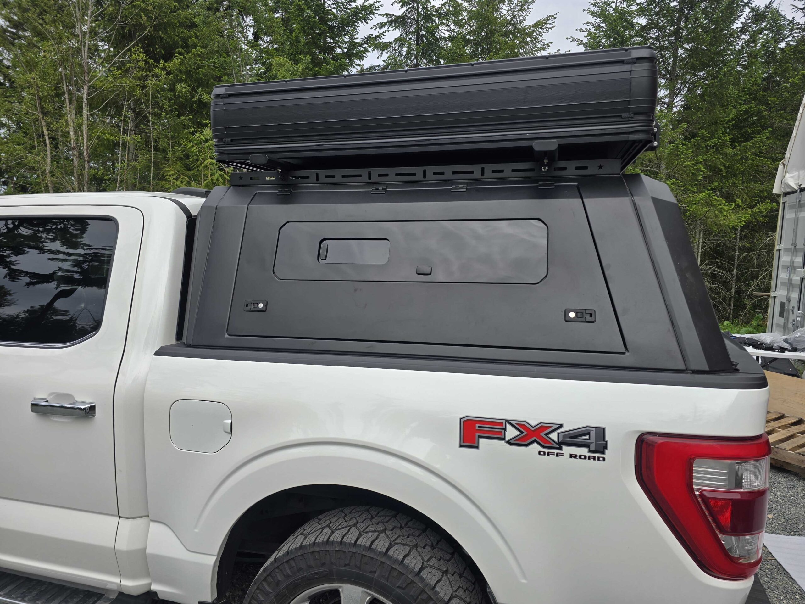 Aluminum truck canopy for Ford F-150 5.5 FT and 6.5 FT models (2015–2024) designed for secure storage and overland setups