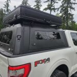 Ridgeline Compact Hardshell Roof Top Tent mounted on an overland vehicle for compact camping and off-road adventures