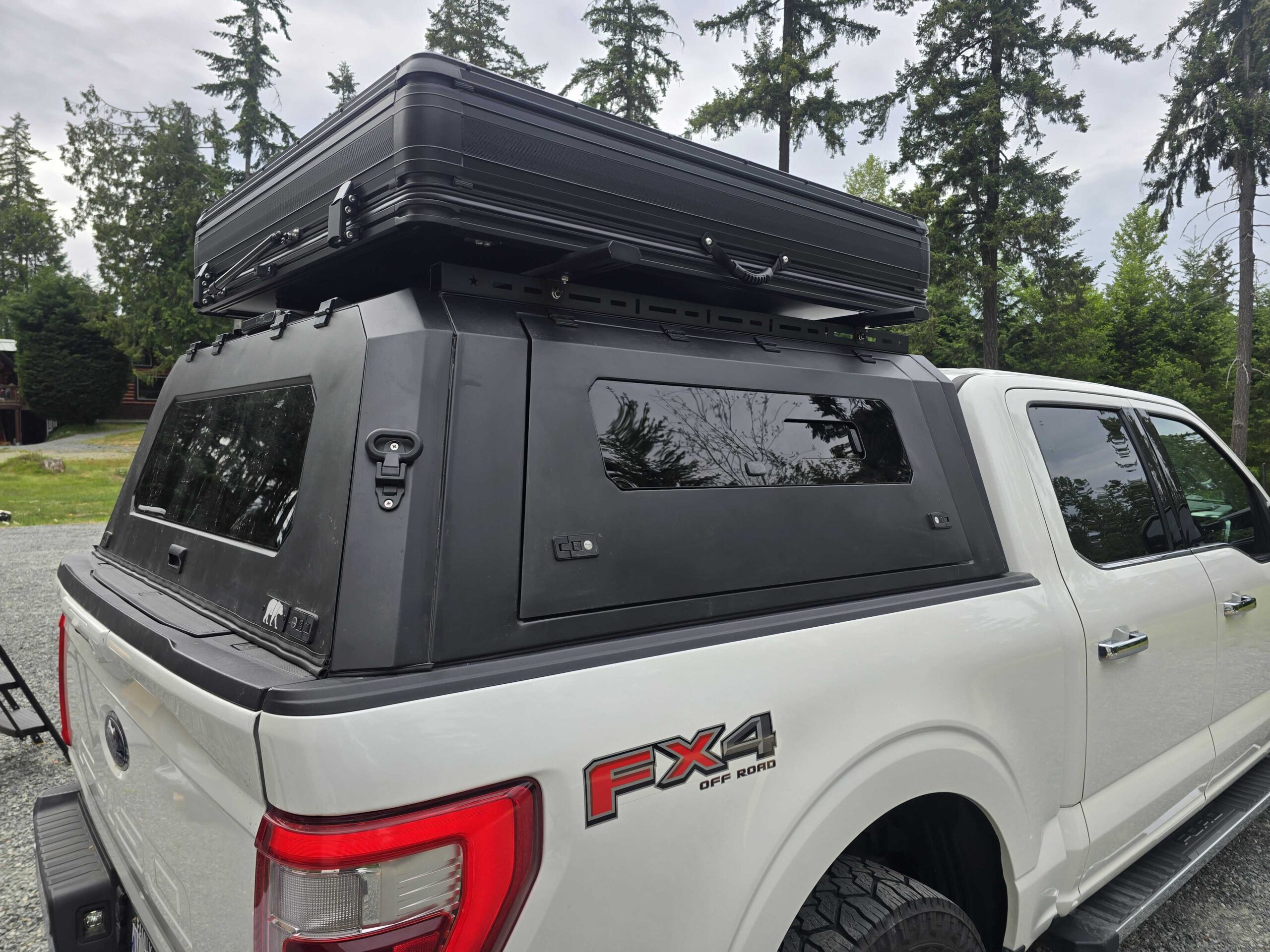 Ridgeline Compact Hardshell Roof Top Tent mounted on an overland vehicle for compact camping and off-road adventures